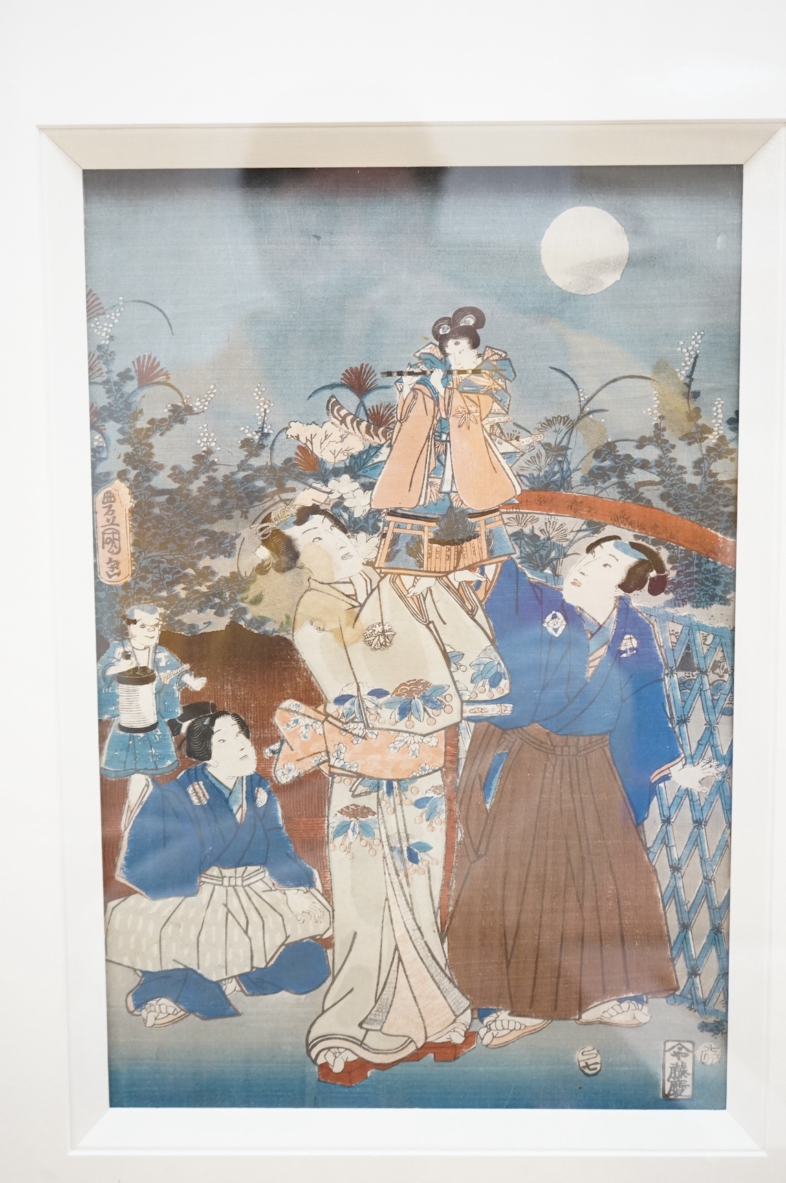 Four Japanese woodblock prints, to include: after Toyokuni - kabuki actors together with a Chinese printed booklet, largest 35 x 23cm. Condition - good